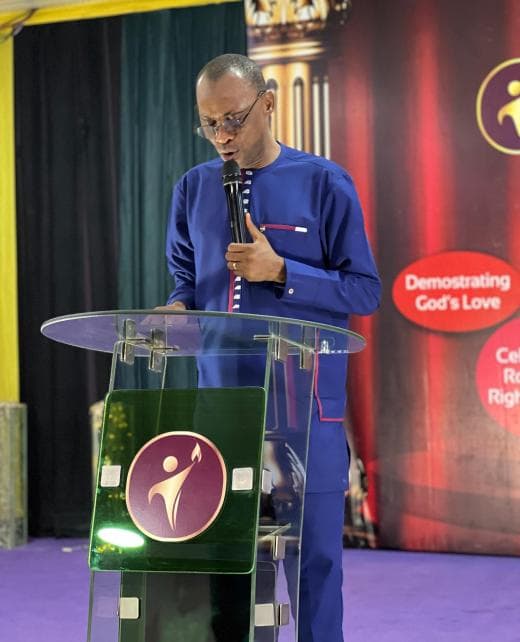 Bishop Jide Ayangbesan speaking at Influencers International Christian Centre.